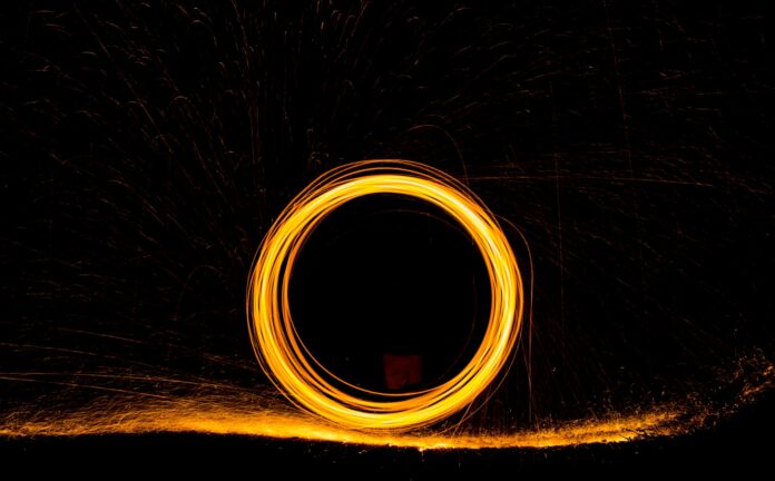 Photo by Jeremy Perkins steel wool photography during nighttime