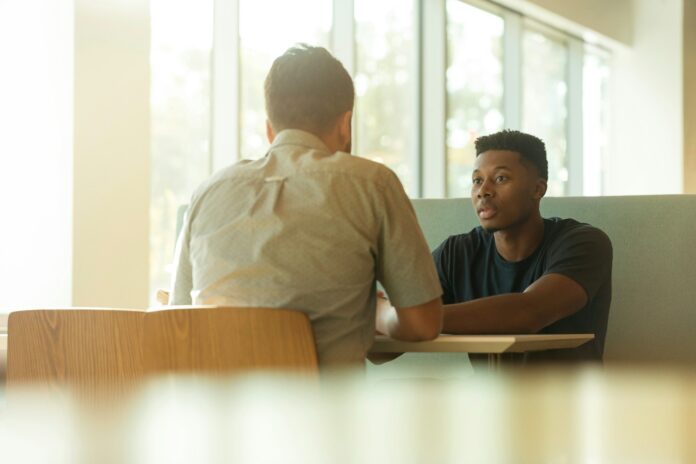 Photo by LinkedIn Sales Solutions two men talking