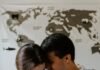 Leve a Cristo os medos da paternidade a man and woman holding a baby in their arms