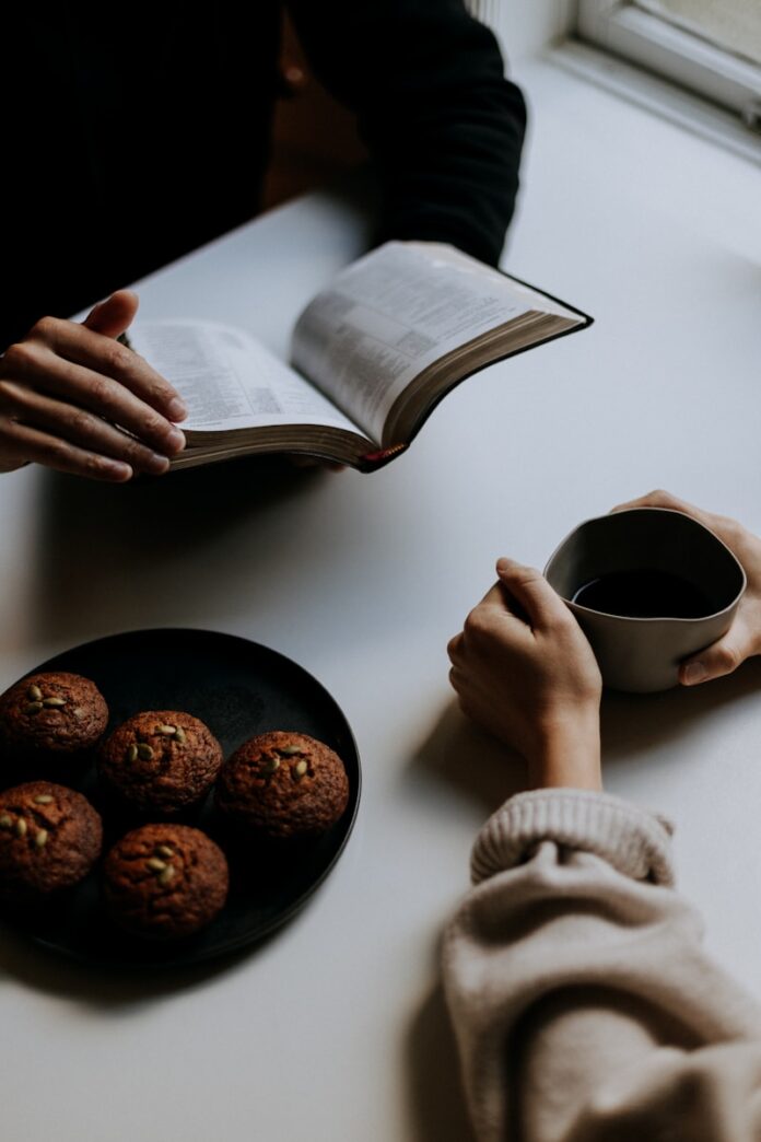 Photo by Priscilla Du Preez 🇨🇦 person holding white ceramic mug with coffee
