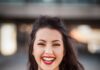 Ele chama seu nome closeup photography of woman smiling