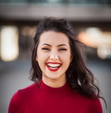 Ele chama seu nome closeup photography of woman smiling