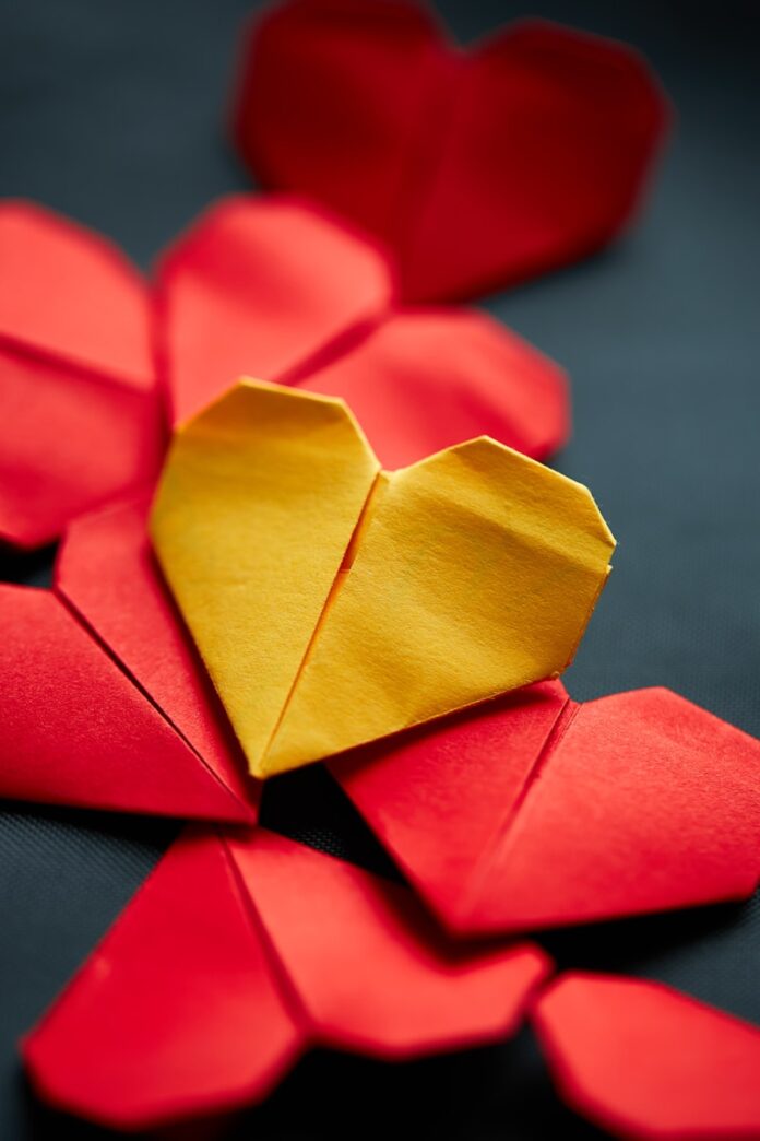 Photo by Dirk Ribbler yellow and red heart shaped paper