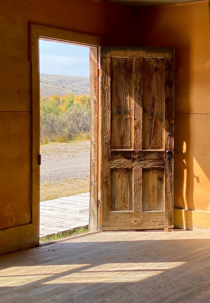 Open door frames nature's view