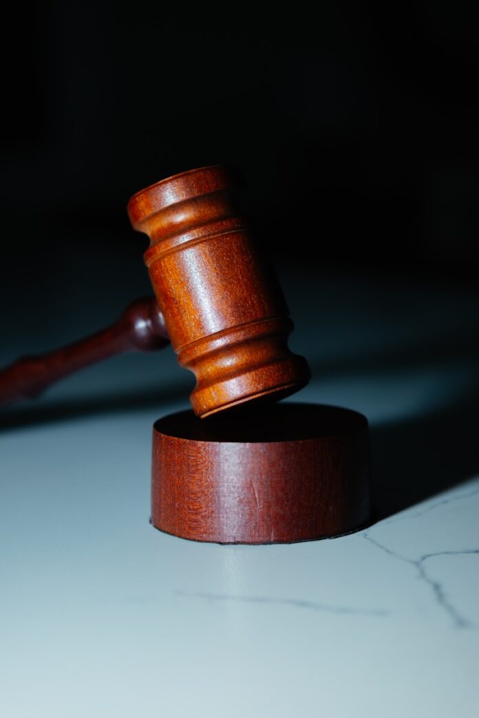 Photo by Wesley Tingey a wooden gaven sitting on top of a white counter