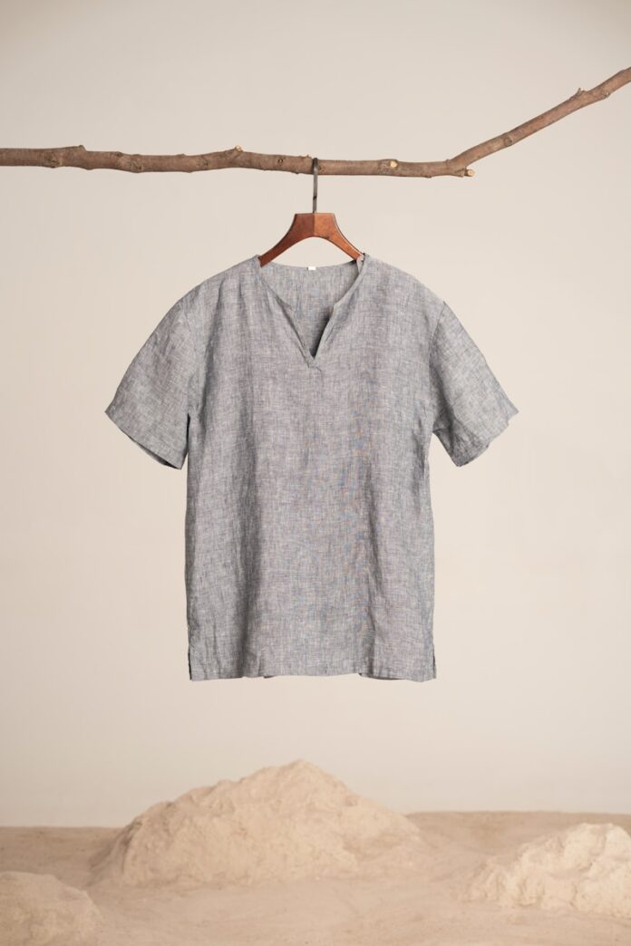 a t - shirt hanging on a clothes line