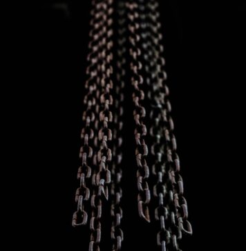 Liberto man's hand and chains