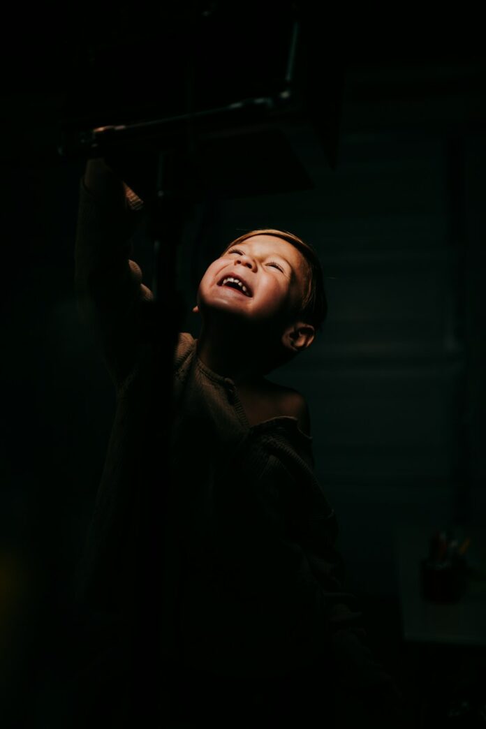 Photo by Nathan Dumlao woman in black leather jacket
