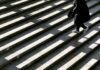 Um passo de cada vez person wearing black jacket walking on stair photography