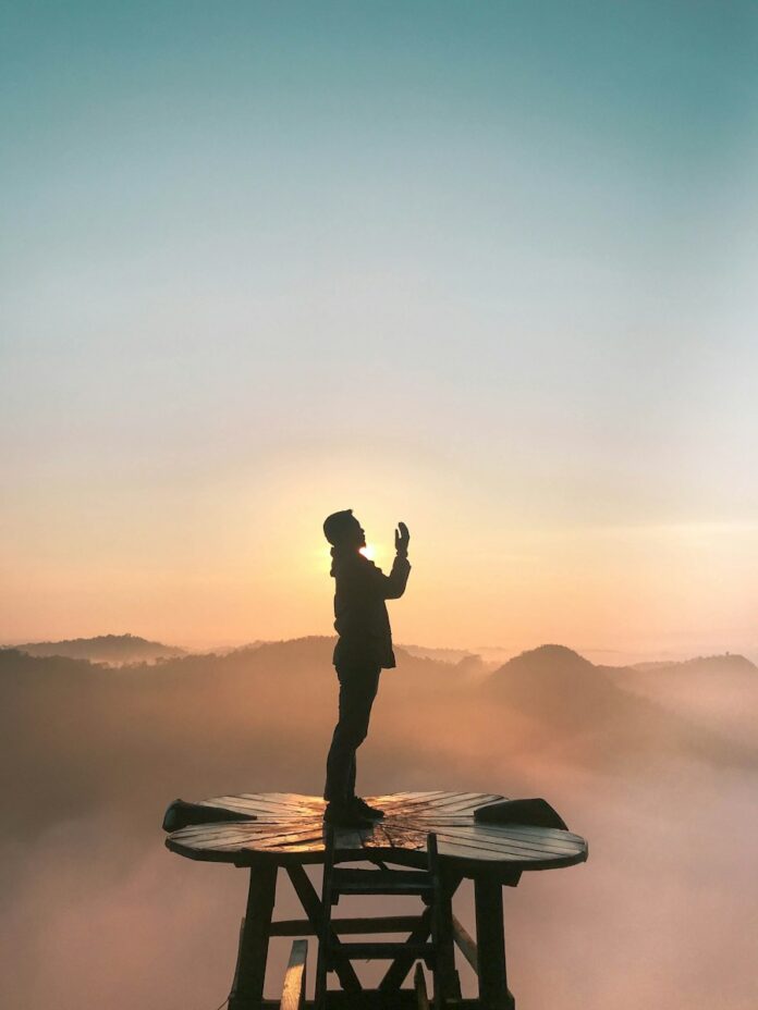 Photo by nega silhouette of praying man